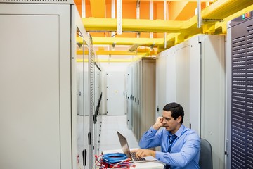 Aufkleber - Technician talking on mobile phone in server room