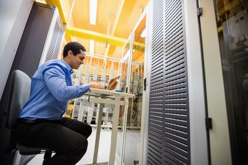 Aufkleber - Technician working on laptop