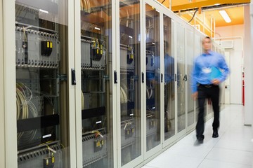 Poster - Technician walking in server room