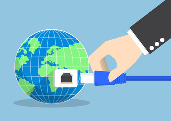 Poster - Businessman connecting plug into the world