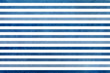 Watercolor dark blue striped background. Blue gradient pattern.