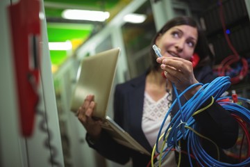 Aufkleber - Technician holding internet cable while talking on phone