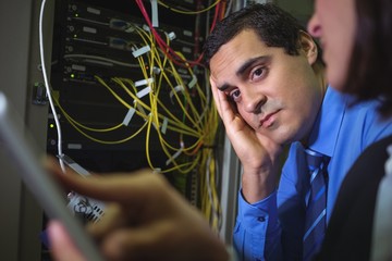 Poster - Technician getting bored while analyzing server