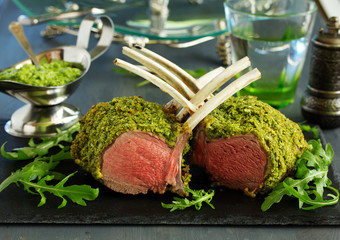 Canvas Print - Rack of lamb in herb cheese and breadcrumbs. A festive meal. Selective focus.