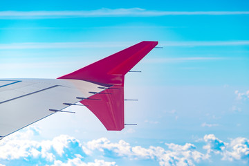 Wall Mural - aerial view of cloud and sky and land with airplane wing from ai