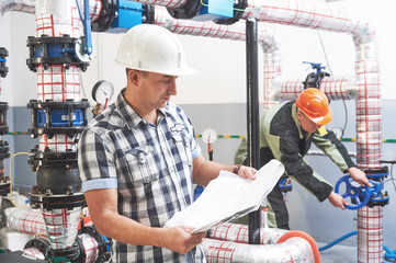 construction engineer worker at industrial boiler room