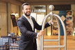 © Kalim - Bellboy in hotel