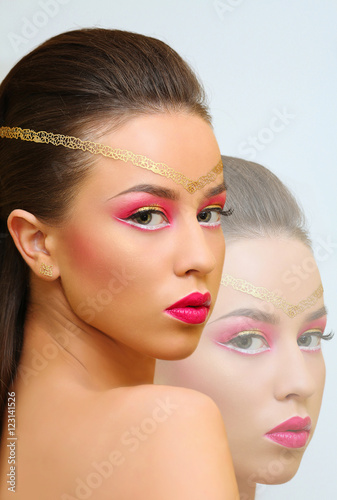 beautiful-brunette-girl-healthy-long-hair-and-holiday-makeup