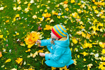 Poster - Little girl outdoors on autumn day