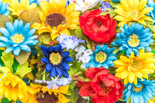 Closeup Of Ukrainian Colored Blue And Yellow Fake Cloth Sunflowers