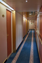 Hotel Or Ship Corridor With Doors To Rooms