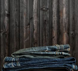 Wall Mural - Denim Jeans Stacked with Wood Panels