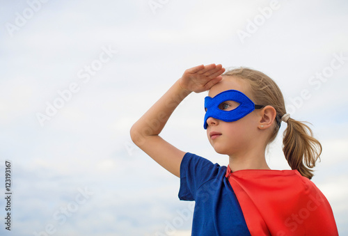 Fotografía Superhero kid looking into distance.