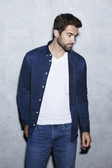 Man wearing blue fashion, looking away