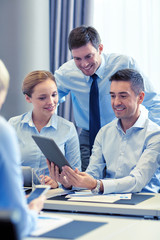 Poster - smiling business people with tablet pc in office