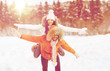 © Syda Productions - happy couple having fun over winter background
