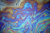 rainbow oil slick background.