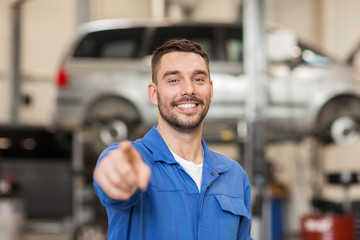 Poster - happy auto mechanic man or smith at car workshop