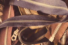 Close-up Of Pile Of Zips, In Leather Jacket Manufacturers