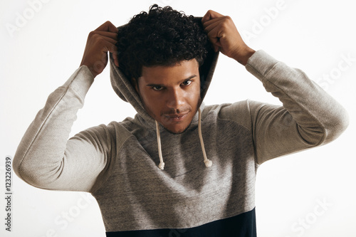 Attractive Black Man Wears Hoodie On His Head With Curly Hair