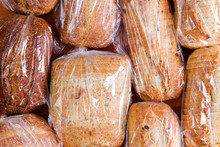 Assortment Of Different Sliced Loaves Of Bread