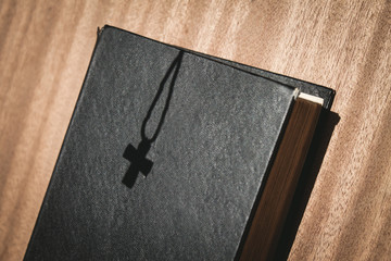 Wall Mural - shadow cross on book