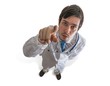 Young doctor is pointing at you with finger. Isolated on white background.