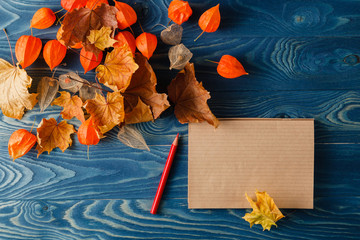 Canvas Print - Autumn notes on blue table
