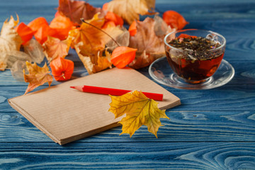 Canvas Print - Autumn notes on blue table
