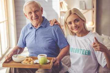 Wall Mural - Volunteer and old people