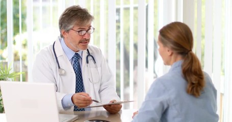 Poster - Doctor man talking sick patient woman in hospital.