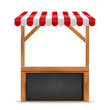 Street stall with red awning and wooden rack.