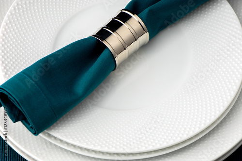 Fotografie, Obraz Decorative Studded Plates with blue napkin