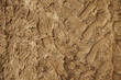 A full page of footprints in the muddy ground background texture