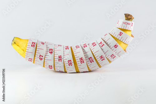 Fotografia, Obraz banana with measurement tape men penis size concept