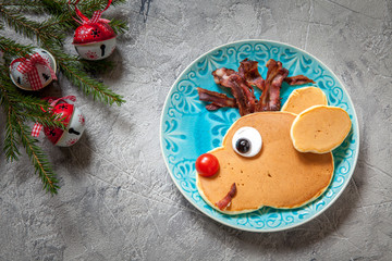 Poster - Christmas food for kid. Rudolph reindeer pancake