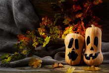 Halloween Smiling Butternut Squash On Dark Rustic Background