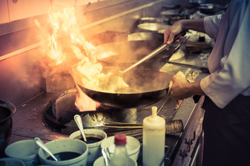 Blurred chef cooking