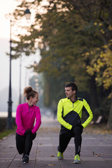  couple warming up before jogging
