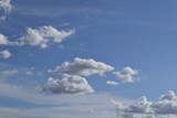 Fototapeta Niebo - blue sky background with tiny clouds