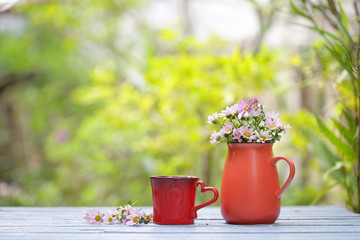 Wall Mural - flower in red pot with red cup