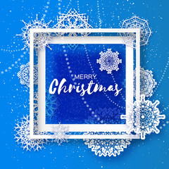 Wall Mural - Merry Christmas Greeting card. Origami Snowflake on blue background