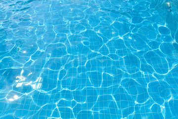  Ripple Water in swimming pool witn sun reflection