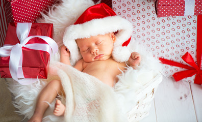 Wall Mural - sleeper newborn baby in  Christmas Santa cap