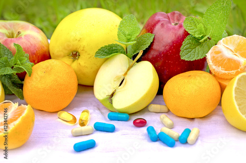Fotografie, Obraz Fresh organic fruit and supplements nutrition - recommendations of a healthy die