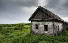 Dilapidated Old Village House In Russia