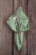 Table place setting with green serviette