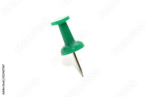 Fotografia, Obraz isolated green push pin on white background