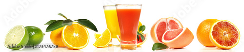 Zdjęcie XXL Owoce cytrusowe i sok owocowy z rzędu