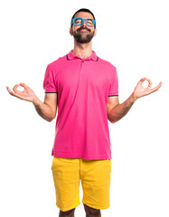 Wall Mural - Man with colorful clothes in zen position